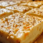 Freshly baked carrot cake bars with cream cheese frosting